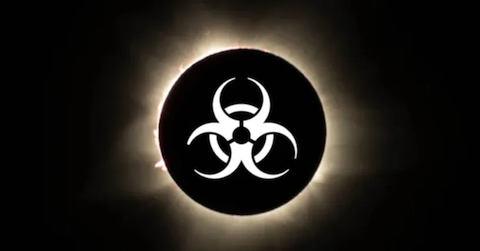 image Bio-hazard Symbol over the Solar Eclipse